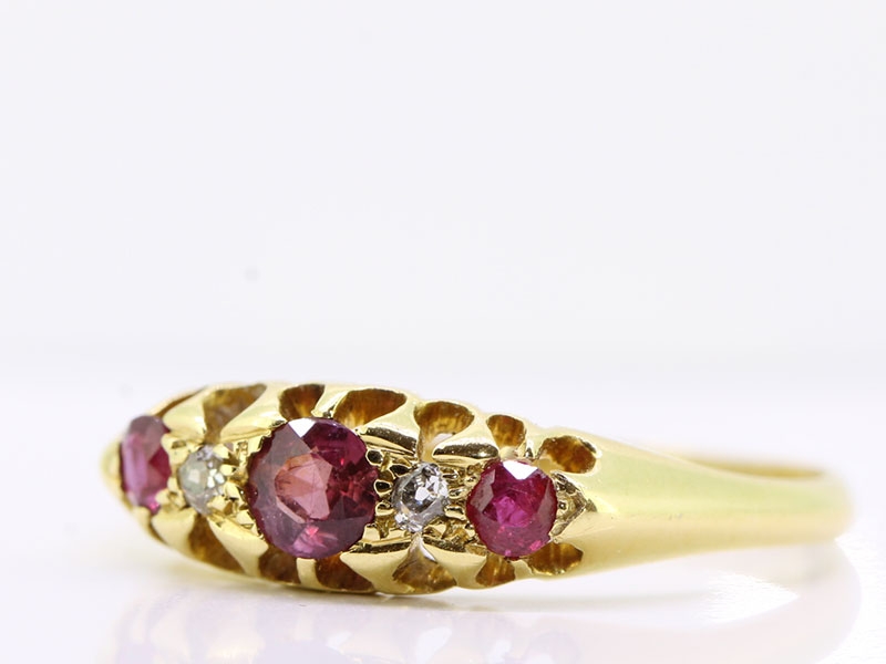 LOVELY RUBY AND DIAMOND 18 CARAT GOLD FIVE STONE RING