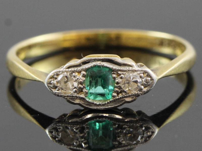 STYLISH EMERALD AND DIAMOND PLATINUM AND 18 CARAT GOLD RING 