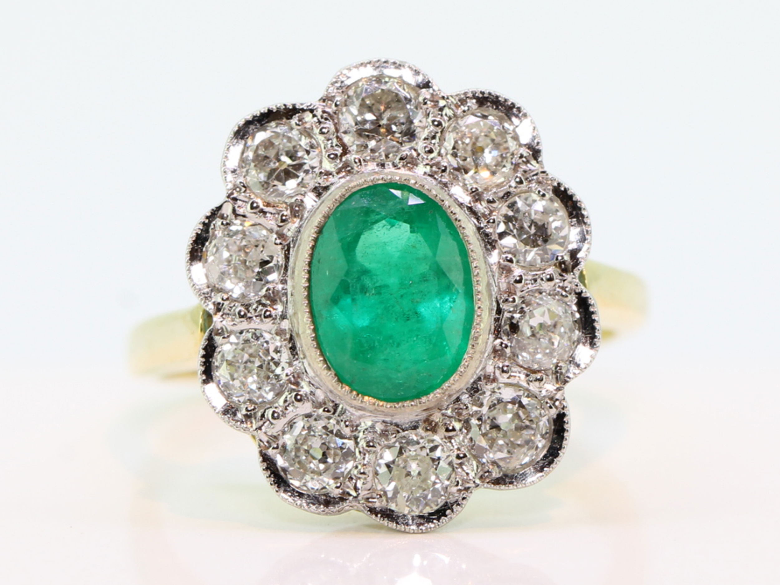 Ravishing Colombian Emerald and Diamond 18 carat Gold Cluster Ring