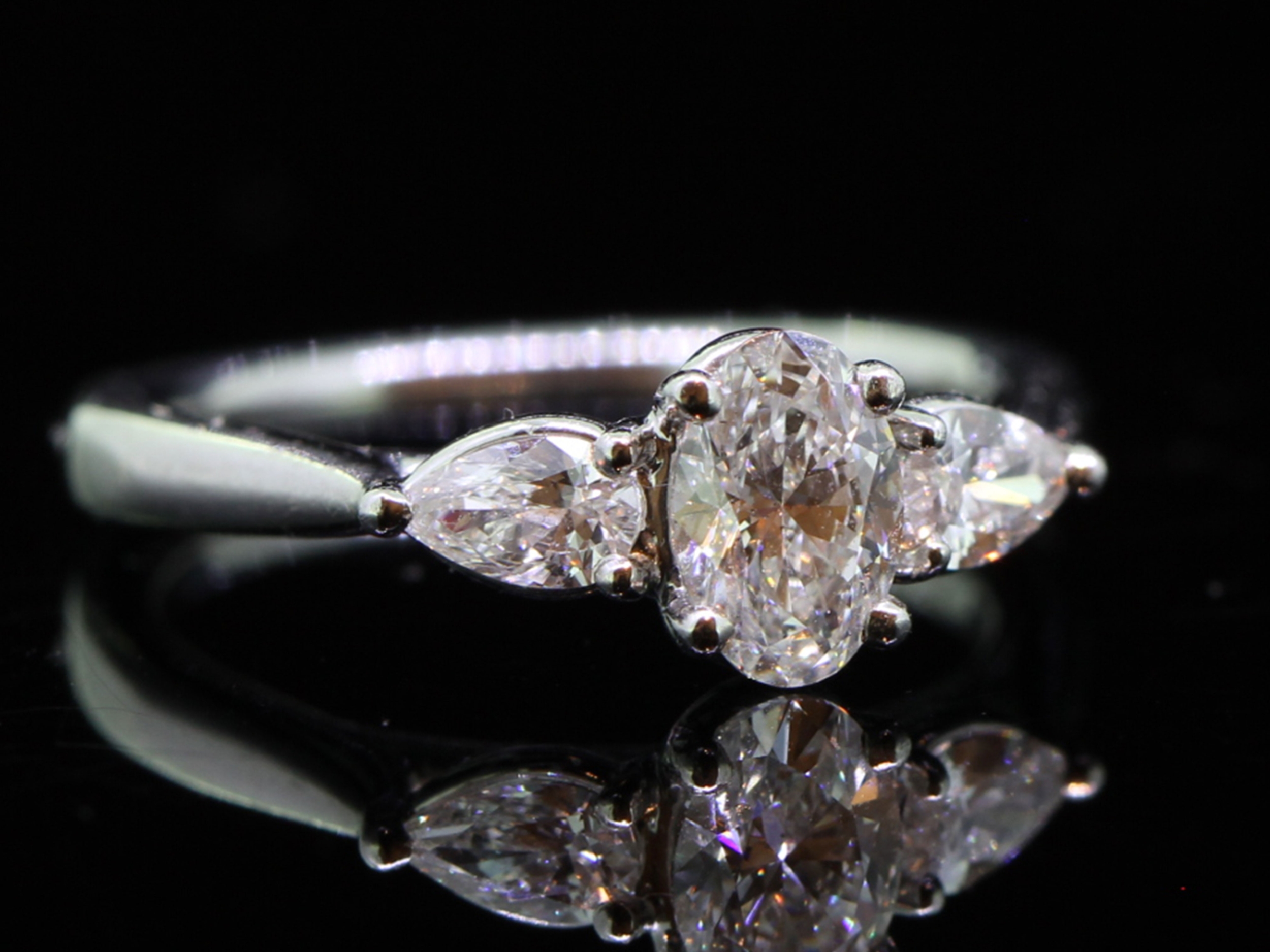 Romantic Platinum Oval and Pear Shape Diamond Trilogy Ring 