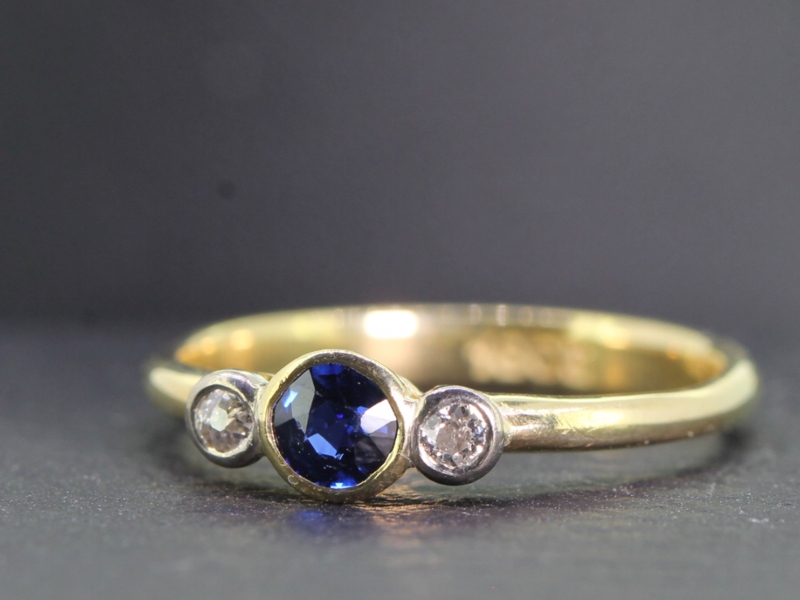 PRETTY SAPPHIRE AND DIAMOND TRILOGY 18 CARAT GOLD RING    