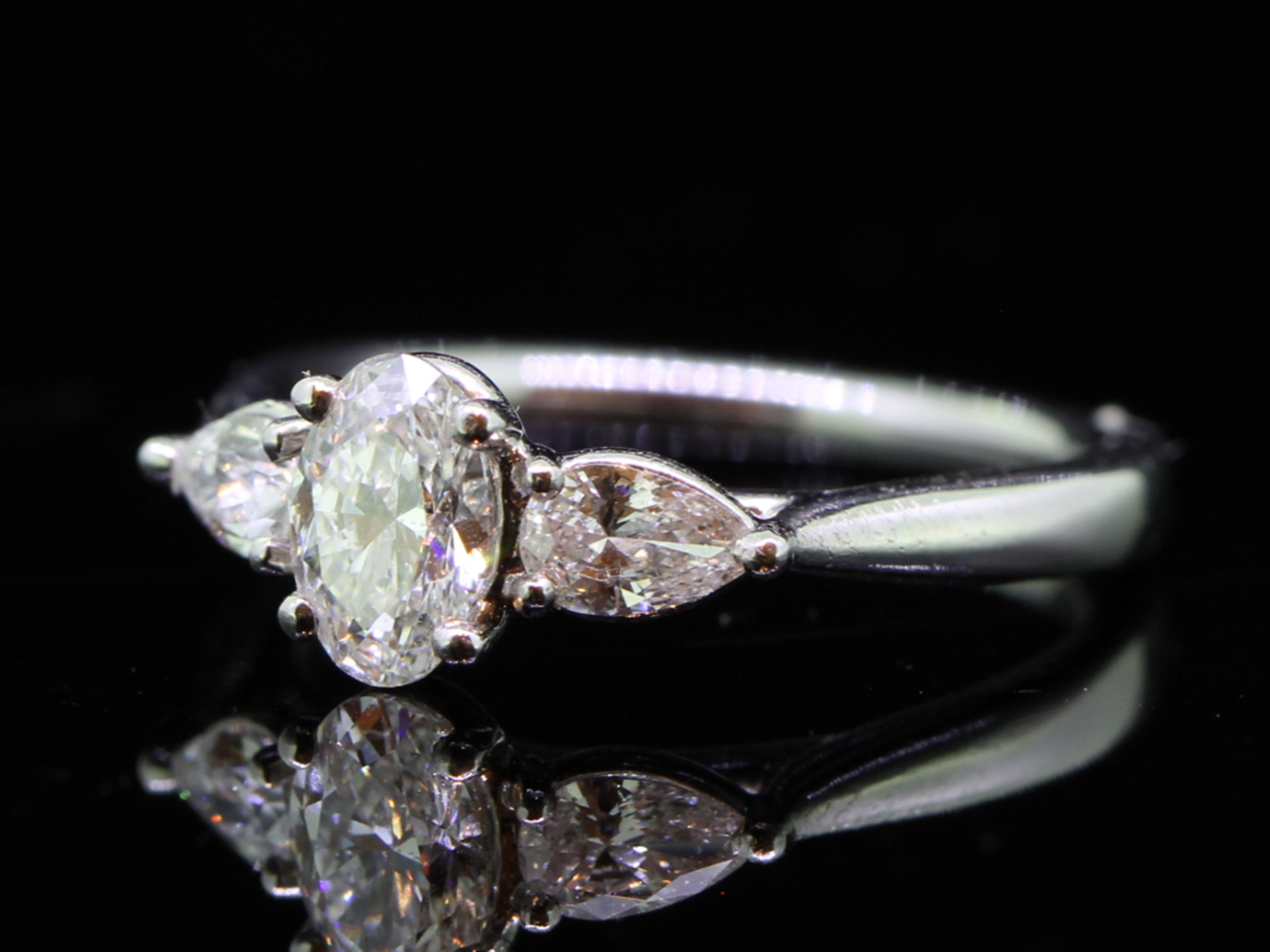 Romantic Platinum Oval and Pear Shape Diamond Trilogy Ring 