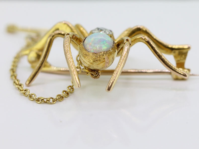 BEAUTIFUL EDWARDIAN 15 CARAT GOLD SPIDER BROOCH SET WITH RUBY, DIAMOND AND OPAL 