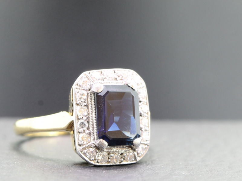 LATE ART DECO RECTANGULAR SAPPHIRE AND DIAMOND 18 CARAT GOLD AND PLATINUM RING