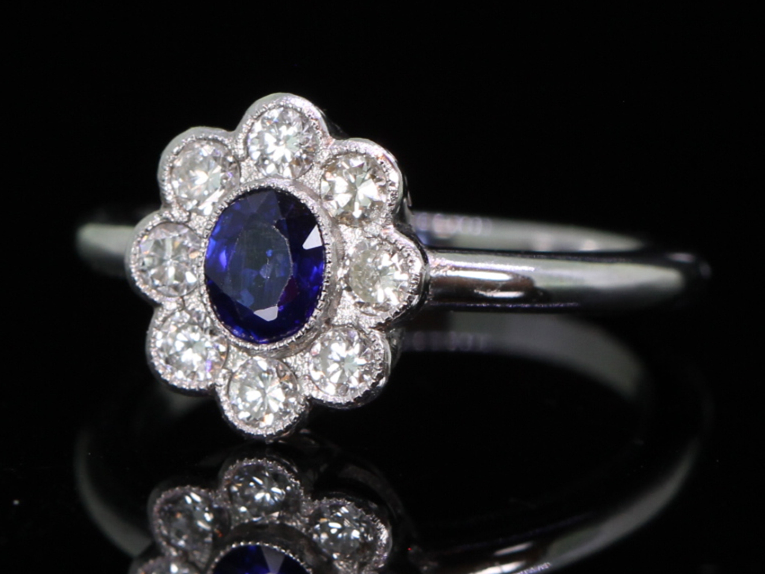 Vintage Sapphire and Diamond Platinum Cluster Ring