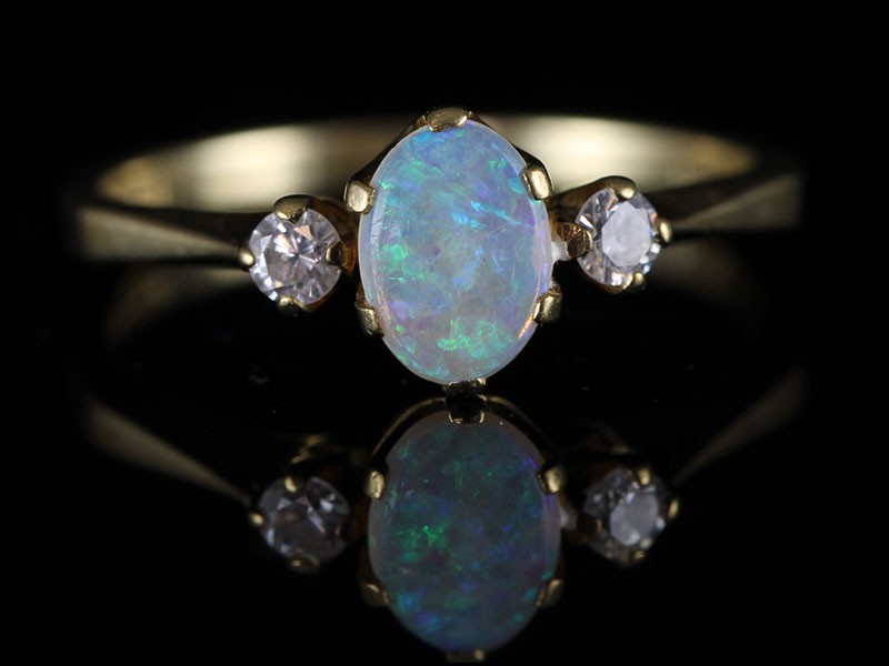 STYLISH  3 STONE OPAL AND DIAMOND 9 CARAT GOLD RING