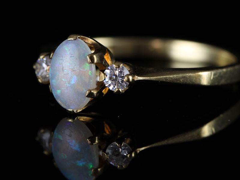 STYLISH  3 STONE OPAL AND DIAMOND 9 CARAT GOLD RING