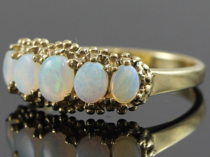 LOVLEY VINTAGE INSPIRED 9 CARAT 5 STONE OPAL RING