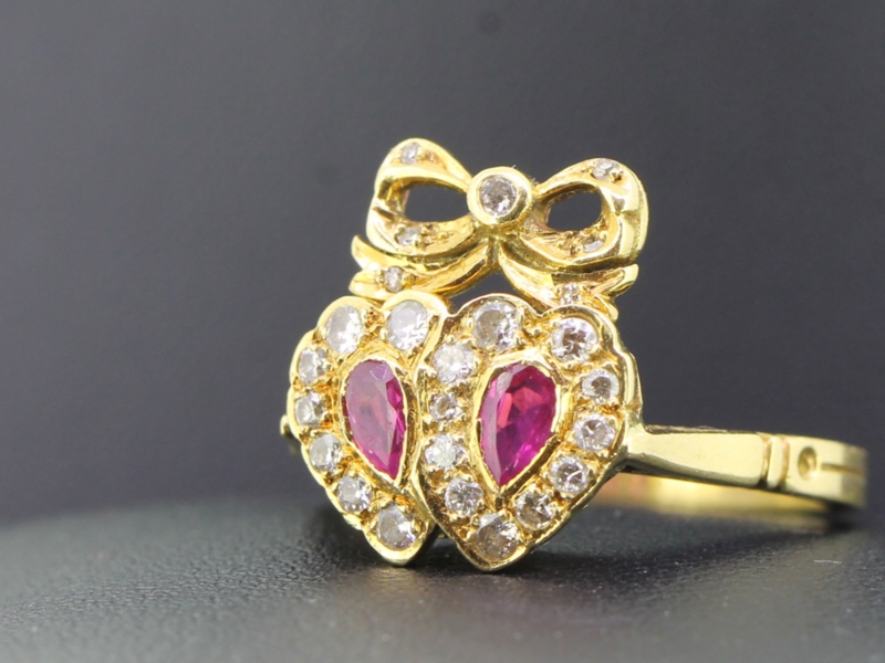 ROMANTIC RUBY AND DIAMOND DOUBLE HEART 18 CARAT GOLD RING
