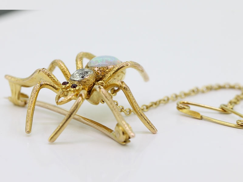 BEAUTIFUL EDWARDIAN 15 CARAT GOLD SPIDER BROOCH SET WITH RUBY, DIAMOND AND OPAL 