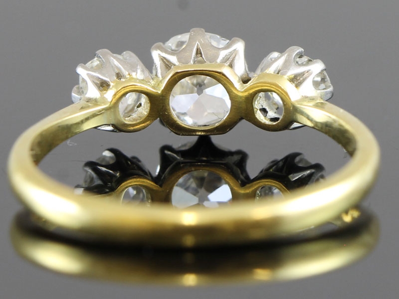  SHOWSTOPPING VINTAGE DIAMOND SET 18 CARAT AND PLATINUM TRILOGY RING