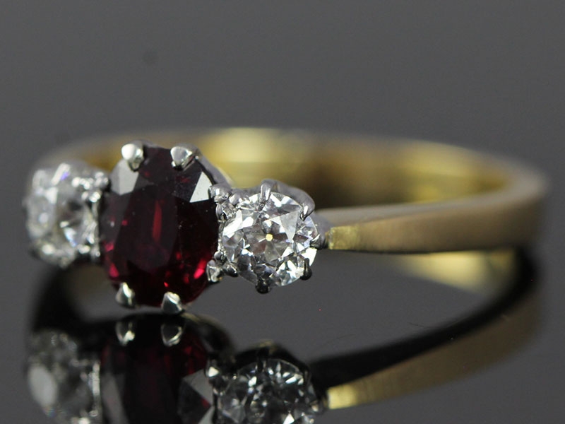 BEAUTIFUL RUBY AND DIAMOND TRILOGY 18 CARAT GOLD RING