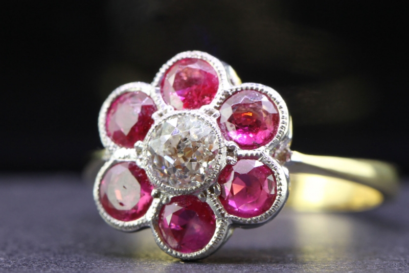 DRAMATIC RUBY AND DIAMOND DAISY CLUSTER 18 CARAT GOLD AND PLATINUM RING