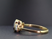 ELEGANT AMETHYST AND DIAMOND 18 CARAT GOLD TRILOGY RING 
