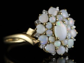 STUNNING 21 STONE FIERY OPAL AND DIAMOND CLUSTER RING IN 9 CARAT GOLD 