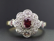 SOPHISTICATED EDWARDIAN RUBY AND DIAMOND 18 CARAT GOLD CLUSTER RING