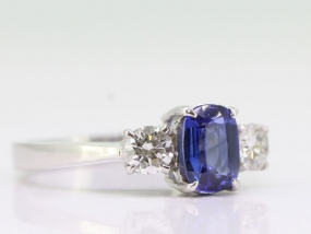 STUNNING CEYLON SAPPHIRE AND DIAMOND 18 CARAT GOLD TRILOGY RING