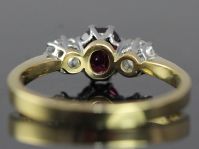 BEAUTIFUL RUBY AND DIAMOND TRILOGY 18 CARAT GOLD RING