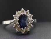 CLASSIC SAPPHIRE AND DIAMOND CLUSTER 18 CARAT GOLD RING
