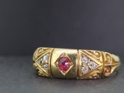 PRETTY RUBY AND DIAMOND 18 CARAT GOLD BAND