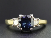  REGAL SAPPHIRE AND DIAMOND TRILOGY 18 CARAT GOLD RING