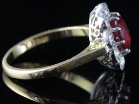 SENSATIONAL RUBY AND DIAMOND CLUSTER 18 CARAT GOLD RING