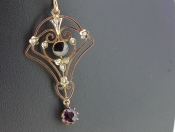 GORGEOUS AMETHYST, PEARL AND GARNET 9 CARAT GOLD PENDANT