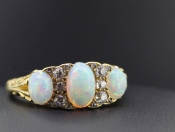 GORGEOUS OPAL AND DIAMOND GYPSY 18 CARAT GOLD RING