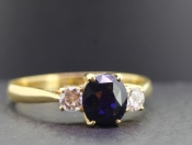 STUNNING SAPPHIRE AND DIAMOND TRILOGY 18 CARAT GOLD RING