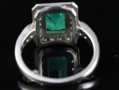 CAPTIVATING EMERALD AND DIAMOND 18 CARAT GOLD RING