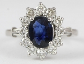 STUNNING SAPPHIRE AND DIAMOND 18 CARAT GOLD CLUSTER RING