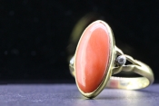 STRIKING OVAL NATURAL CORAL AND DIAMOND 18 CARAT GOLD RING