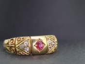 PRETTY RUBY AND DIAMOND 18 CARAT GOLD BAND