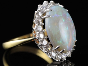 MAGNIFICENT 6 CARAT OPAL AND DIAMOND CLUSTER 18 CARAT GOLD RING