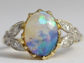 STUNNING BLACK CRYSTAL OPAL AND DIAMOND EDWARDIAN INSPIRED 18 CARAT GOLD RING 