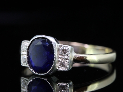 SAPPHIRE AND DIAMOND ART DECO INSPIRED SILVER AND 9 CARAT GOLD RING