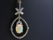 MAGNIFICENT EDWARDIAN DIAMOND AND OPAL 15 CARAT GOLD PENDANT AND CHAIN