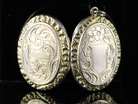 GORGEOUS EDWARDIAN OVAL ENGRAVED 9 CARAT LOCKET