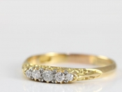 PRETTY EDWARDIAN FIVE STONE DIAMOND 18 CARAT GOLD RING