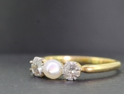 PRETTY PEARL AND DIAMOND TRILOGY 18 CARAT GOLD RING