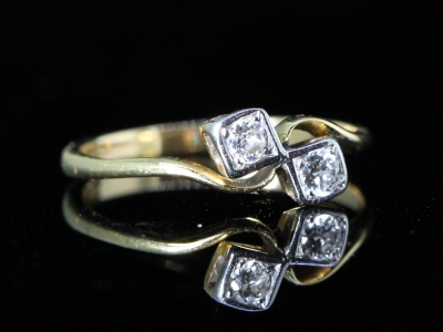 Edwardian Cross Over Diamond Platinum and 18ct Gold Ring