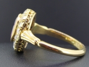 SOPHISTICATED ALMANDINE GARNET AND DIAMOND 18 CARAT GOLD CLUSTER RING