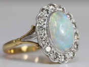  ALLURING OPAL AND DIAMOND 18 CARAT GOLD CLUSTER RING