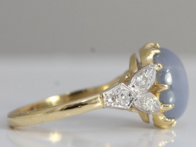 STUNNING STAR SAPPHIRE AND DIAMOND ART DECO INSPIRED 18 CARAT GOLD COCKTAIL RING