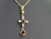  STUNNING EDWARDIAN BURMESE RUBY AND DIAMOND PENDANT AND 18 CARAT GOLD CHAIN