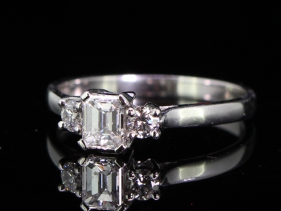 Beautiful Emerald Cut Diamond Platinum Trilogy Ring