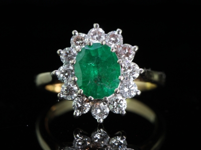 STUNNING COLOMBIAN EMERALD AND DIAMOND 18 CARAT GOLD CLUSTER RING