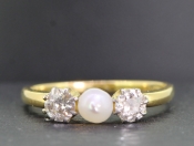 PRETTY PEARL AND DIAMOND TRILOGY 18 CARAT GOLD RING