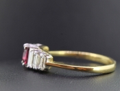 STUNNING SEVEN STONE RUBY AND DIAMOND 18 CARAT GOLD RING