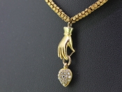 UNIQUE 15 CARAT GOLD HAND AND CHAIN WITH A PEARL AND DIAMOND HEART PENDANT